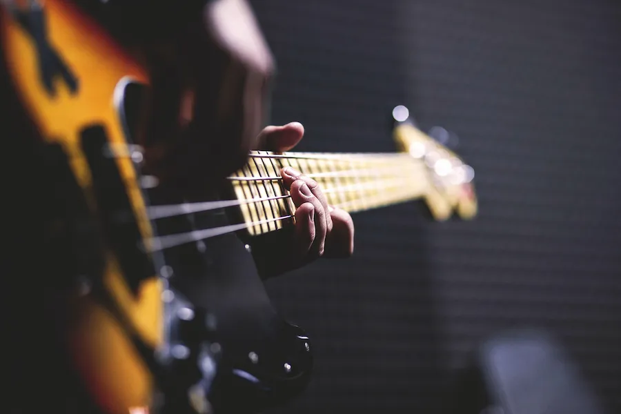 Person playing guitar